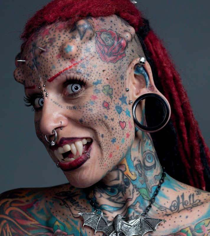 This woman has let her toenails grow very long, and she can only wear title=