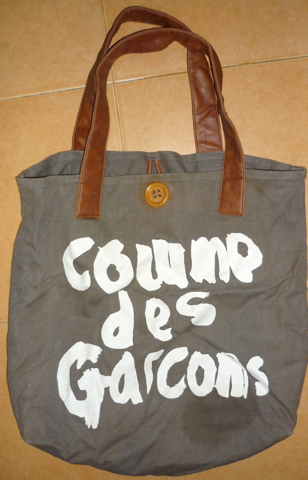 comme des garcons sling bag