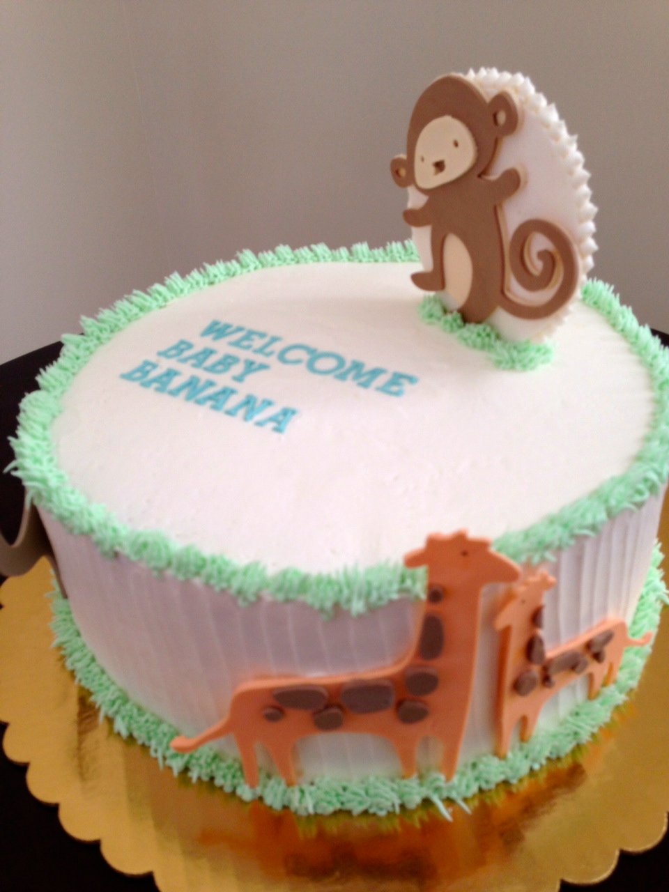 a. party style modern animal baby shower cake