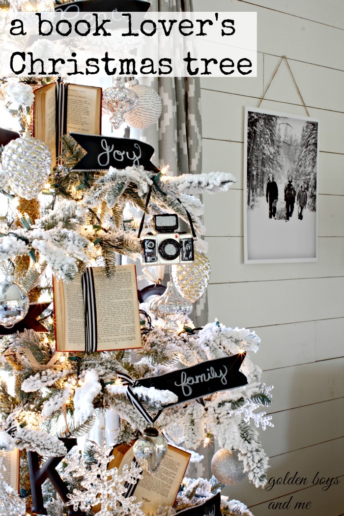 Flocked Christmas tree decorated with small books, black and white accents and mercury glass ornaments - www.goldenboysandme.com