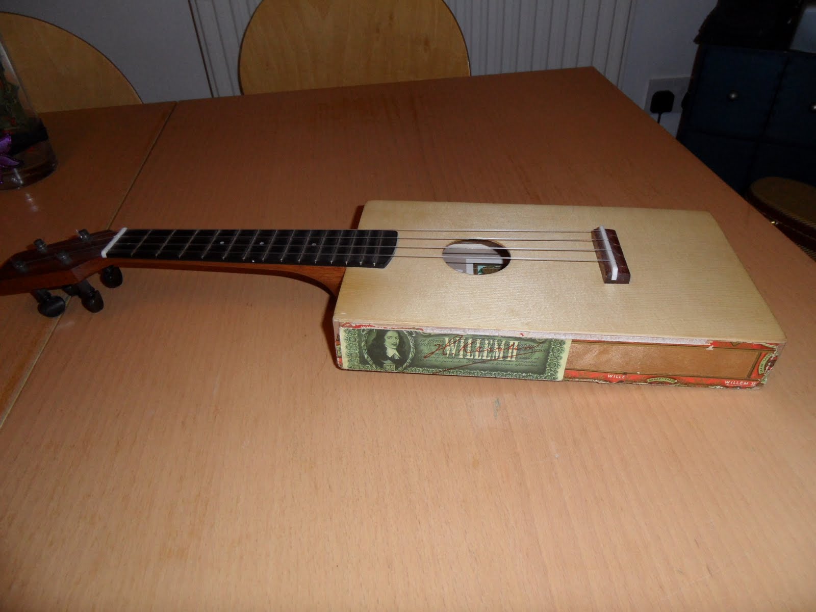 The Ukulele Restoration Barn A Handmade cigar box uke. made by Rob Collins