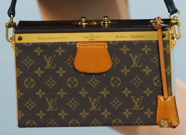 This is the cutest lil Louis Vuitton Mini trunk 🧊i dont know what wil