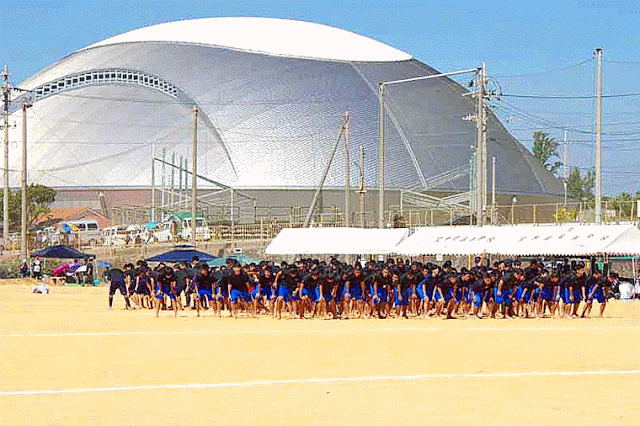 Ginoza Dome, athletic field, male students running