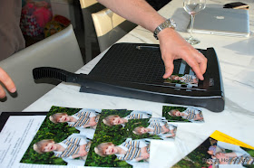 cutting school photos with a paper cutter