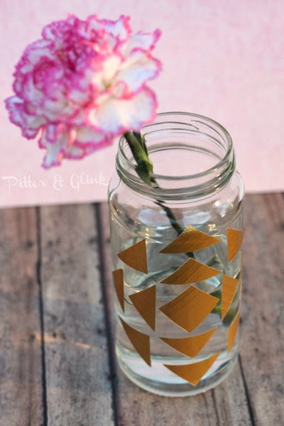 Create a trendy geometric print vase using a recycled glass jar and Duck tape! PitterandGlink.com