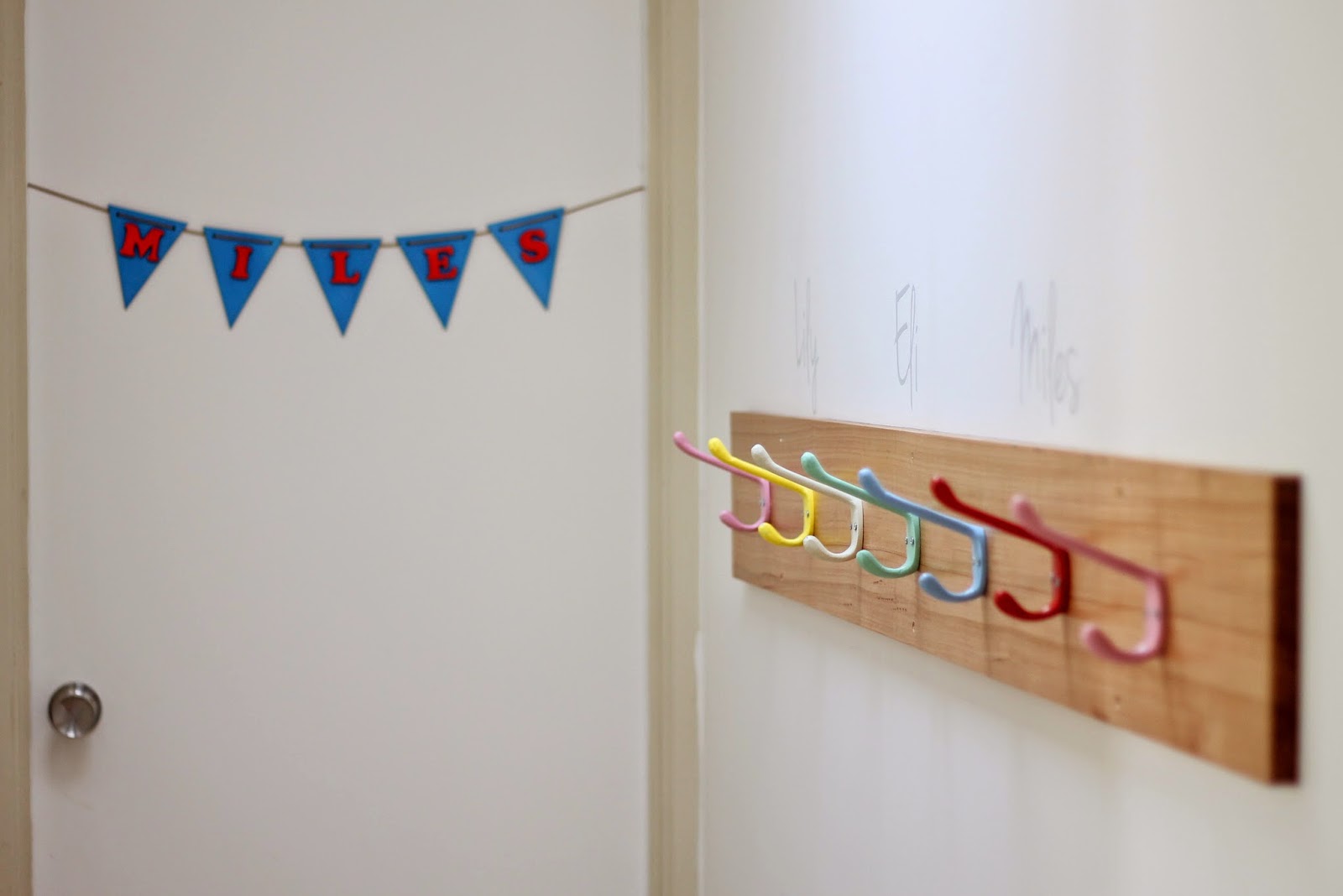 living, loving, laughing... a school bag hook wall // getting
