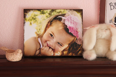 http://thegirlinspired.com/2012/05/canvas-photos-diy-revisited/