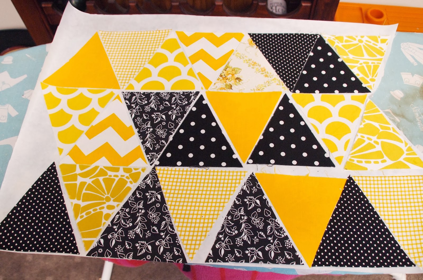 THE THRIFTY CHALLENGE A pennant quilt.