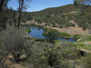 Small blue lake near the summit.