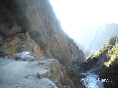 Damaged and dangerous landslide road conditions in the Garhwal Himalayas during the Char Dham Yatra