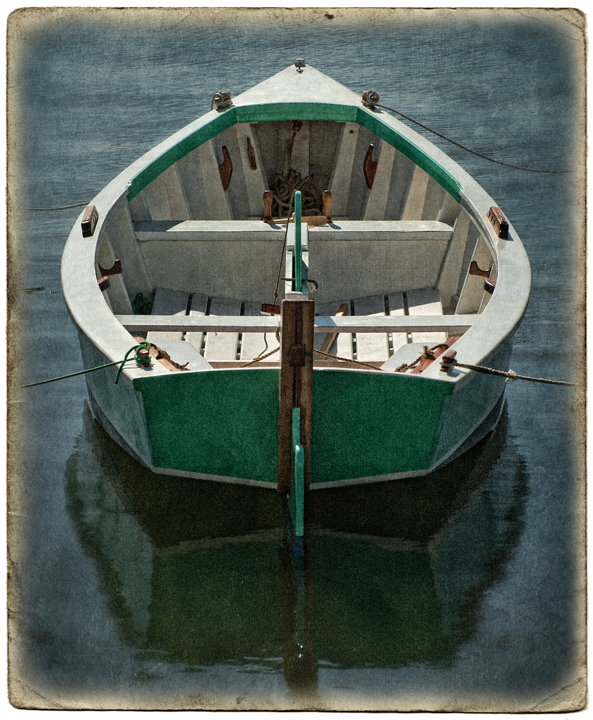  by dan routh re edit of a wooden boat from beaufort north carolina