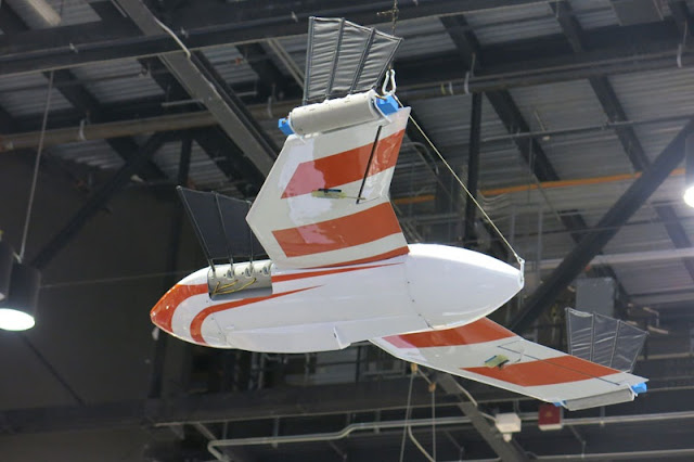 Under its Flimmer program (for ''flying swimmer''), the NRL team built a ''Test Sub'' — basically a submarine with wings —and simply worked around the fact that it was heavier than the typical drone Flimmer drone