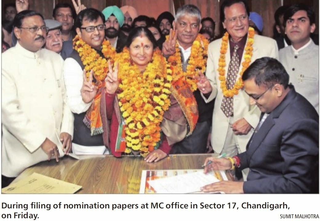 During filing of nomination papers at MC office in Sector 17, Chandigarh on Friday. Alongwith Ex-MP Satya Pal Jain & other