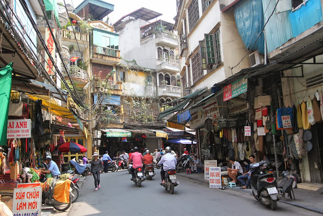 Hanoi Old Quarter is surrounded by craft work businesses, food, hotels and shopping area along the 36 Old Streets in Hanoi, Vietnam Hanoi Old Quarter is surrounded by craft work businesses, food, hotels and shopping area along the 36 Old Streets in Hanoi, Vietnam
