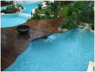 Pools and wood. Wooden decks on poolside