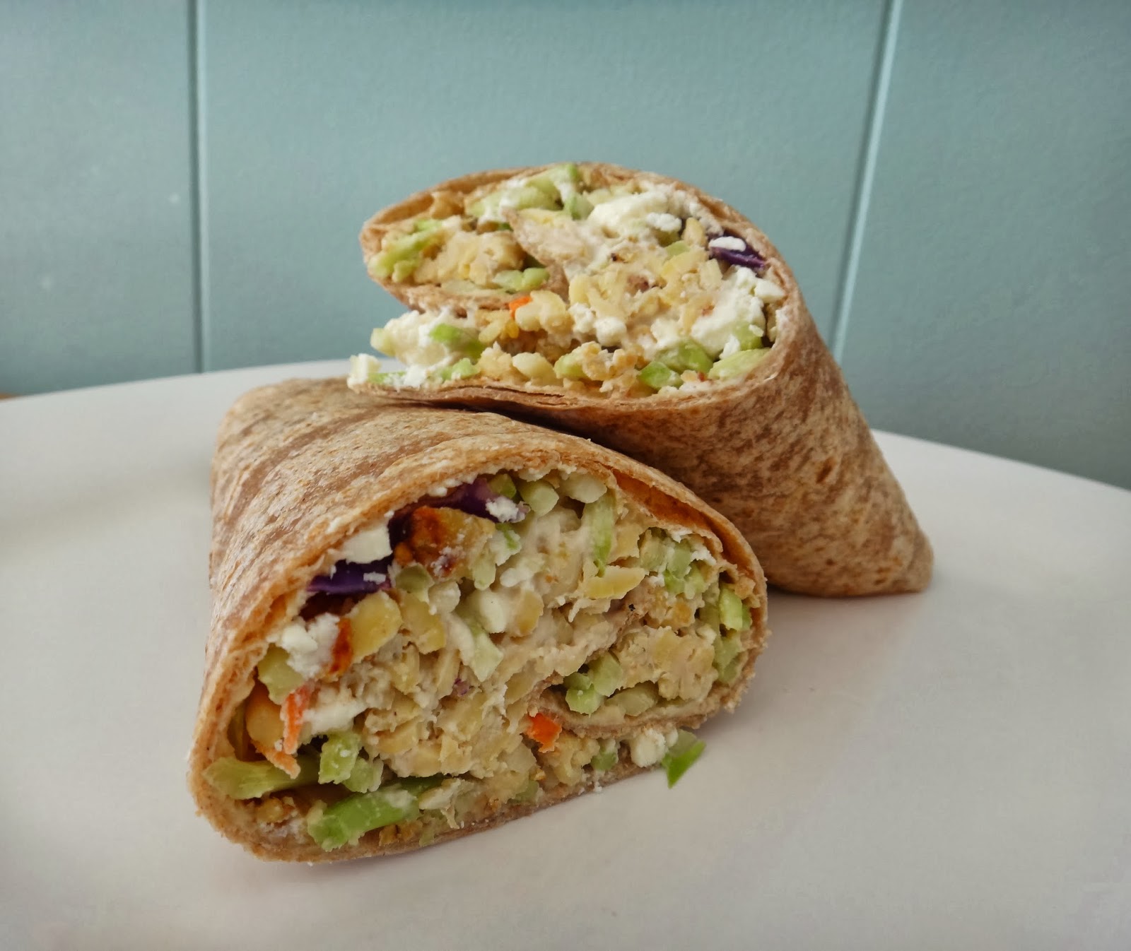 Tahini Tempeh Wrap with Hummus, Feta and Broccoli Slaw