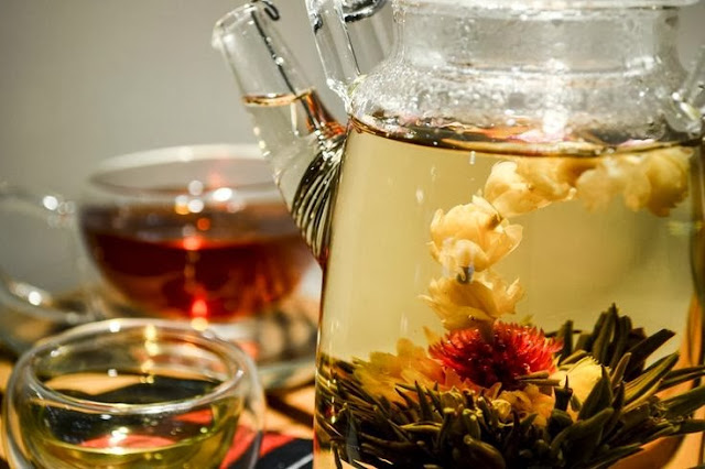 Herbal tea jug and cups Herbal tea in jug and cups