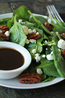 toasted pecan and goat cheese spinach salad with balsamic vinaigrette