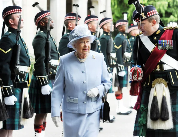 Queen Elizabeth has inspected her guard at the gates of Balmoral Castle