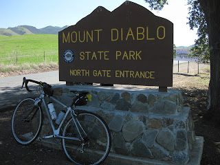 My bicycle at Mt. Diablo State Park North Gate entrance sign