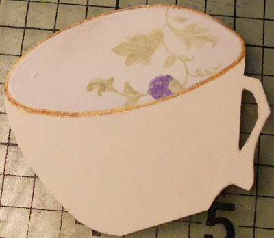 handmade paper cup in progress, the inside part has a botanical motif with a purple berry