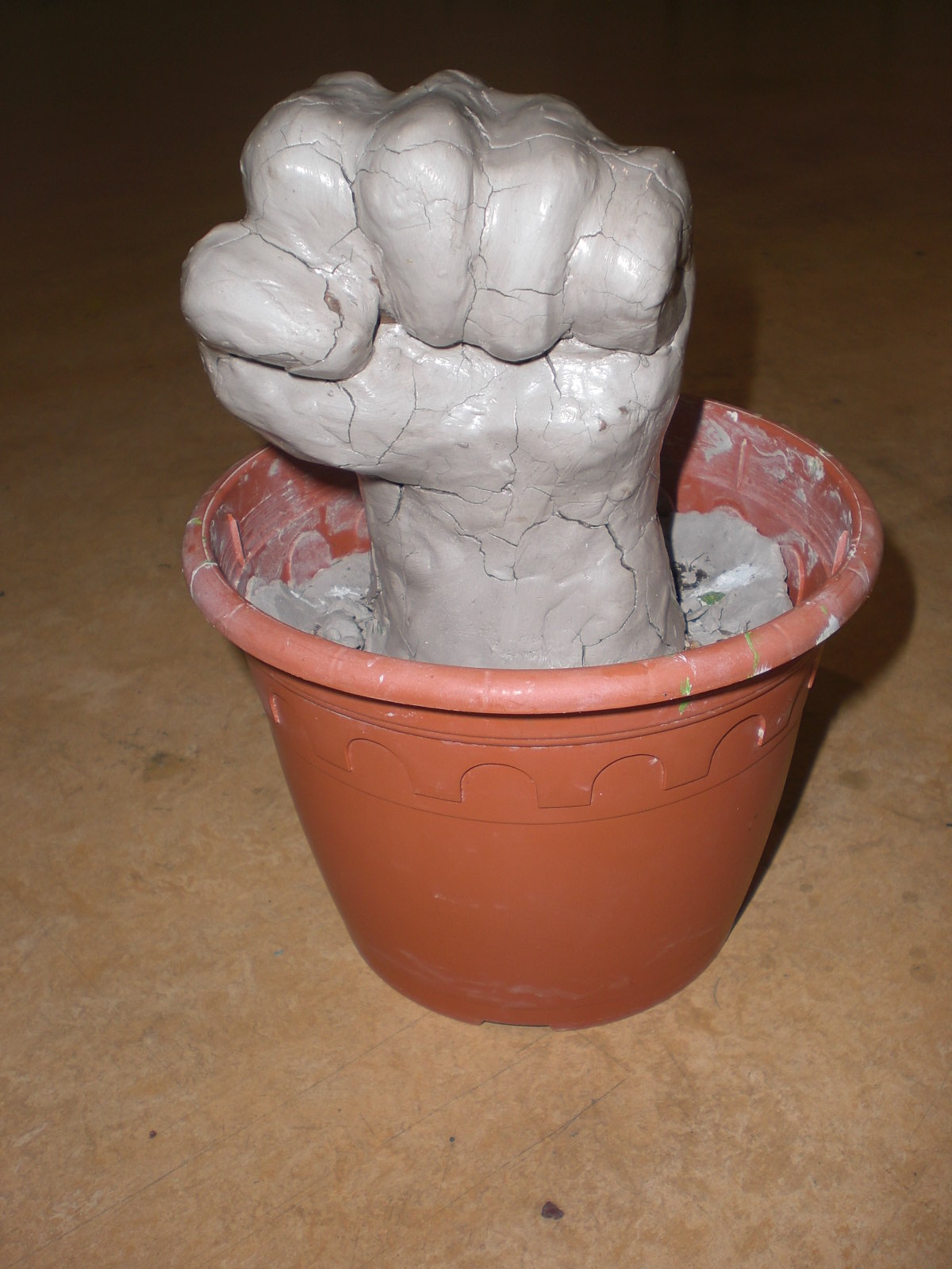 Image result for fist in clay pot