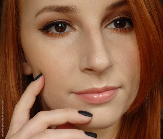 Orange lower lash line makeup Adjusting Beauty