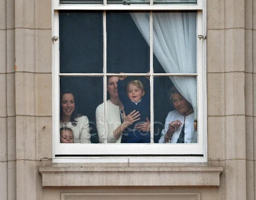Prince George at the window of Buckingham Palace with nanny Maria Teresa Turrion Borrallo Trooping the Colour ceremony, 