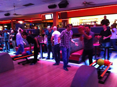 Group of people at the bowling alley lane