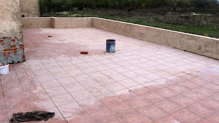 The grouting is being done on the floor tiles now The grouting is being done on the floor tiles now