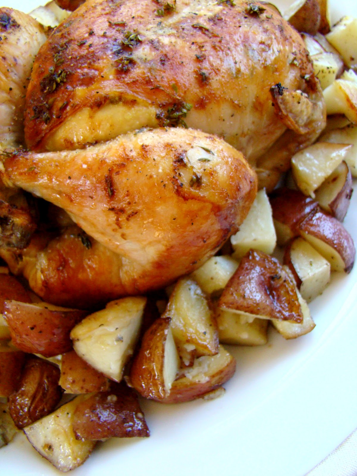 Lemon thyme roasted chicken with potatoes