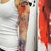 Abstract wall tattoo on whole arm