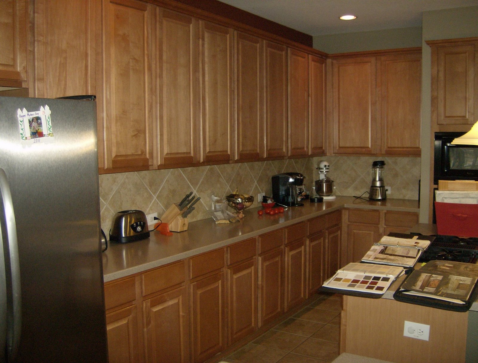 Honey colored kitchen cabinets Honey Oak Cabinets with Dark Floors
