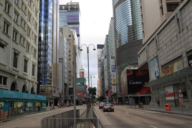 A quiet morning at the busy street of Tsim Sha Tsui, Kowloon in Hong Kong A quiet morning at the busy street of Tsim Sha Tsui, Kowloon in Hong Kong