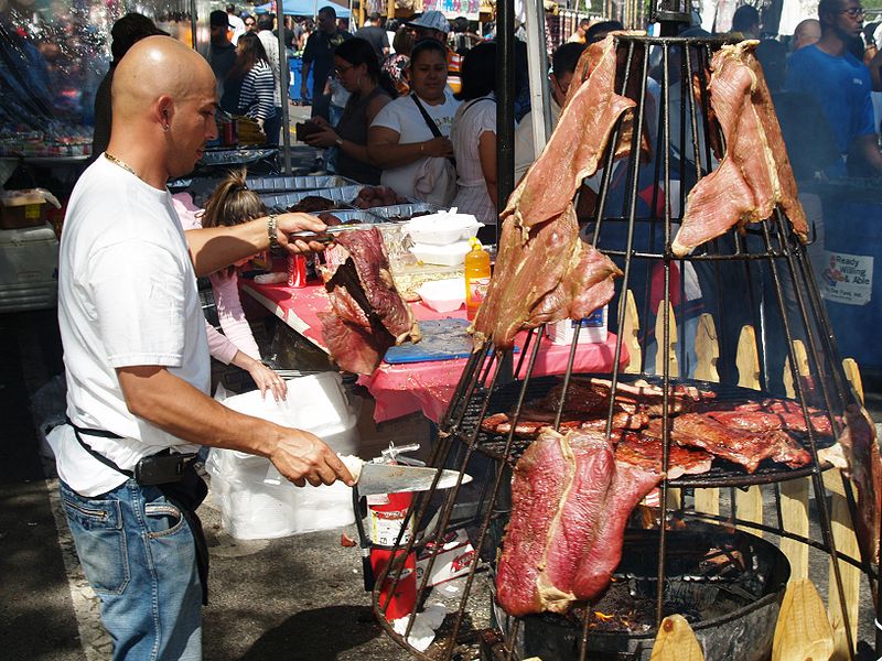 [Image: Hanging_Meat_at_a_Street_Fair_2.JPG]