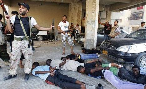 LibyaRebelsRoundingUpBlacks.jpg