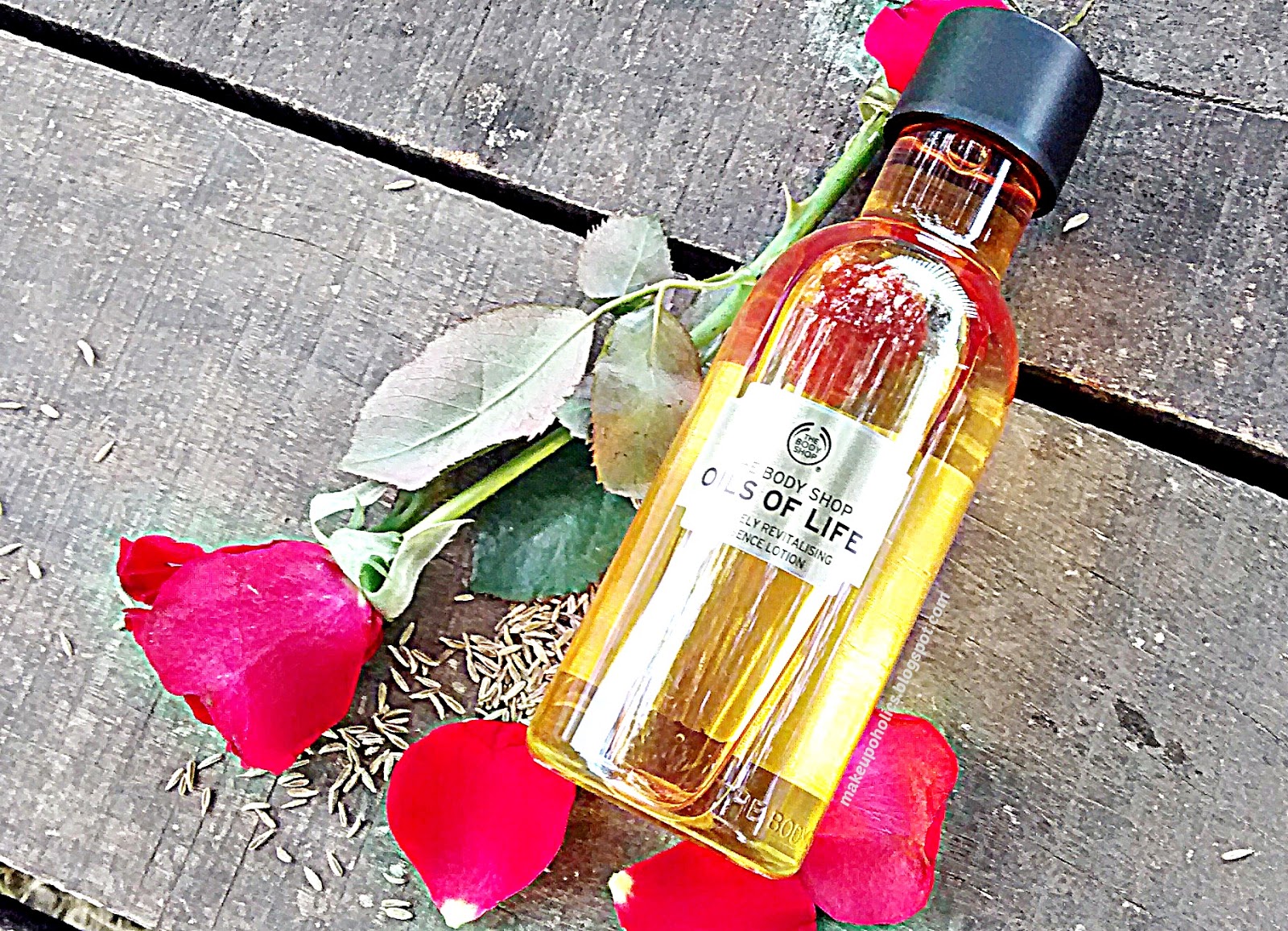 Review THE BODY SHOP OILS OF LIFE™ INTENSELY REVITALISING ESSENCE