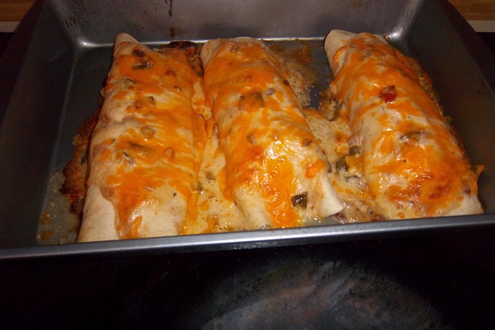 The Random Life Yummy Cheesy Chicken Enchilada's!