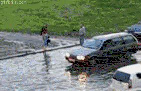 funny water skiing on flooded roads