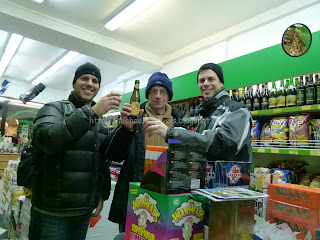 a group of men standing in a store