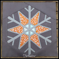 http://www.craftsy.com/pattern/quilting/other/snowflake-12-inch-paper-pieced/59189