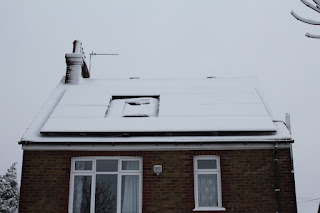 Snow on solar panels Snow on solar panels