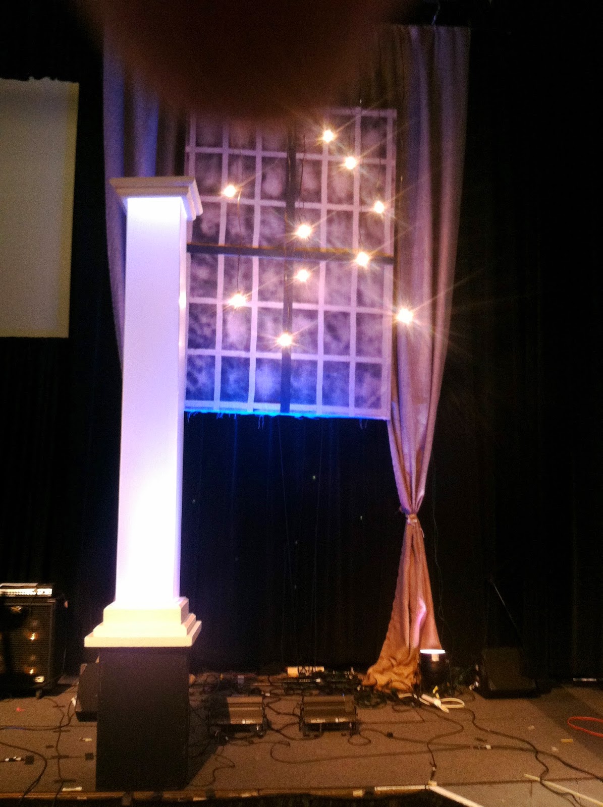 Columns and burlap windows as wedding decor