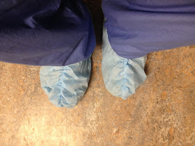 Picture of my feet in scrub booties.