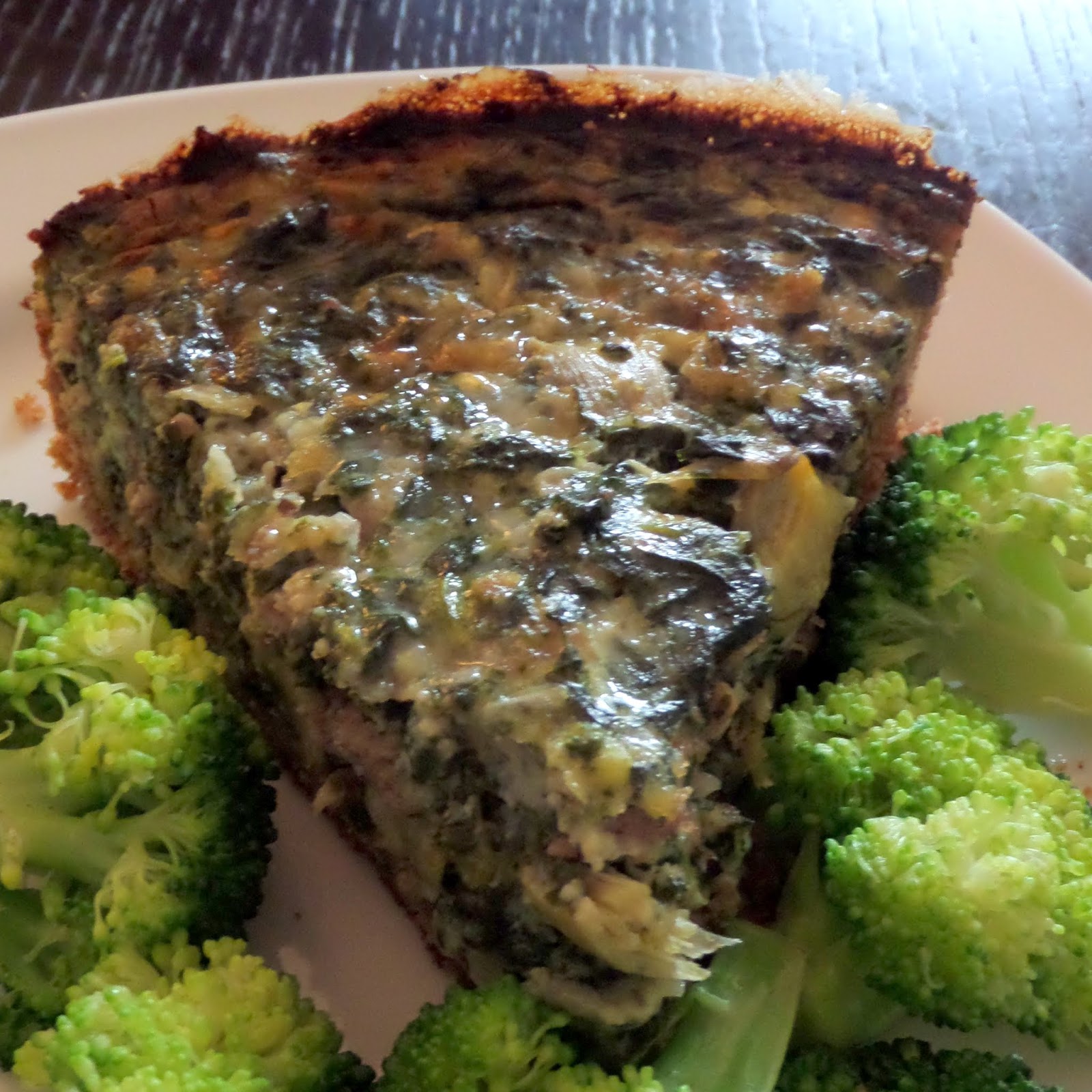 Spinach Artichoke Quiche:  A quiche packed with turkey sausage, cheese, spinach, and artichoke hearts.