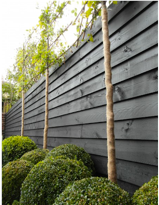 Mur en bois noir Tim Kok via Nat et nature