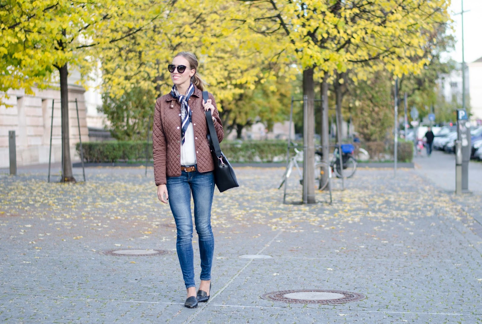 kristjaana mere classy fall outfit quilted jacket blue skinny jeans silk scarf flats kristjaana mere classy fall outfit quilted jacket blue skinny jeans silk scarf flats