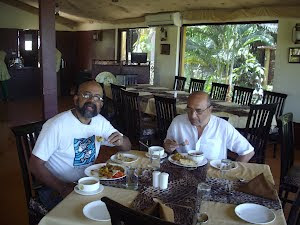 Room-Mate Mr Feroz.Kerawalla and self having lunch at "Lion Safari Camp" dining hall restaurant.