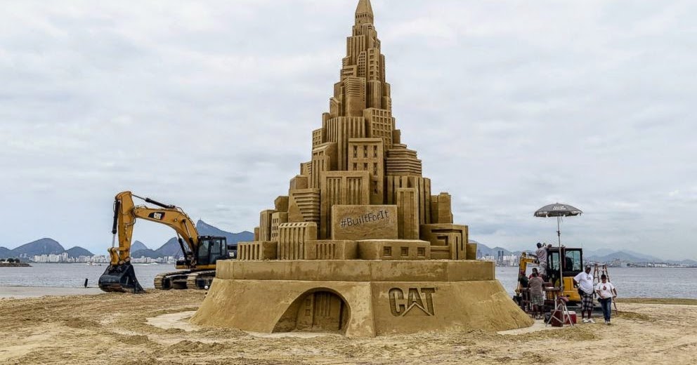 Just A Car Guy Caterpillar hires "Sand Guys" to build world record tall sand castle in Brazil