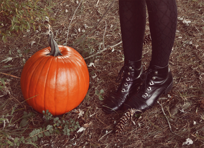 Black lace-up boots, black wool-blend tights Black lace-up boots, black wool-blend tights